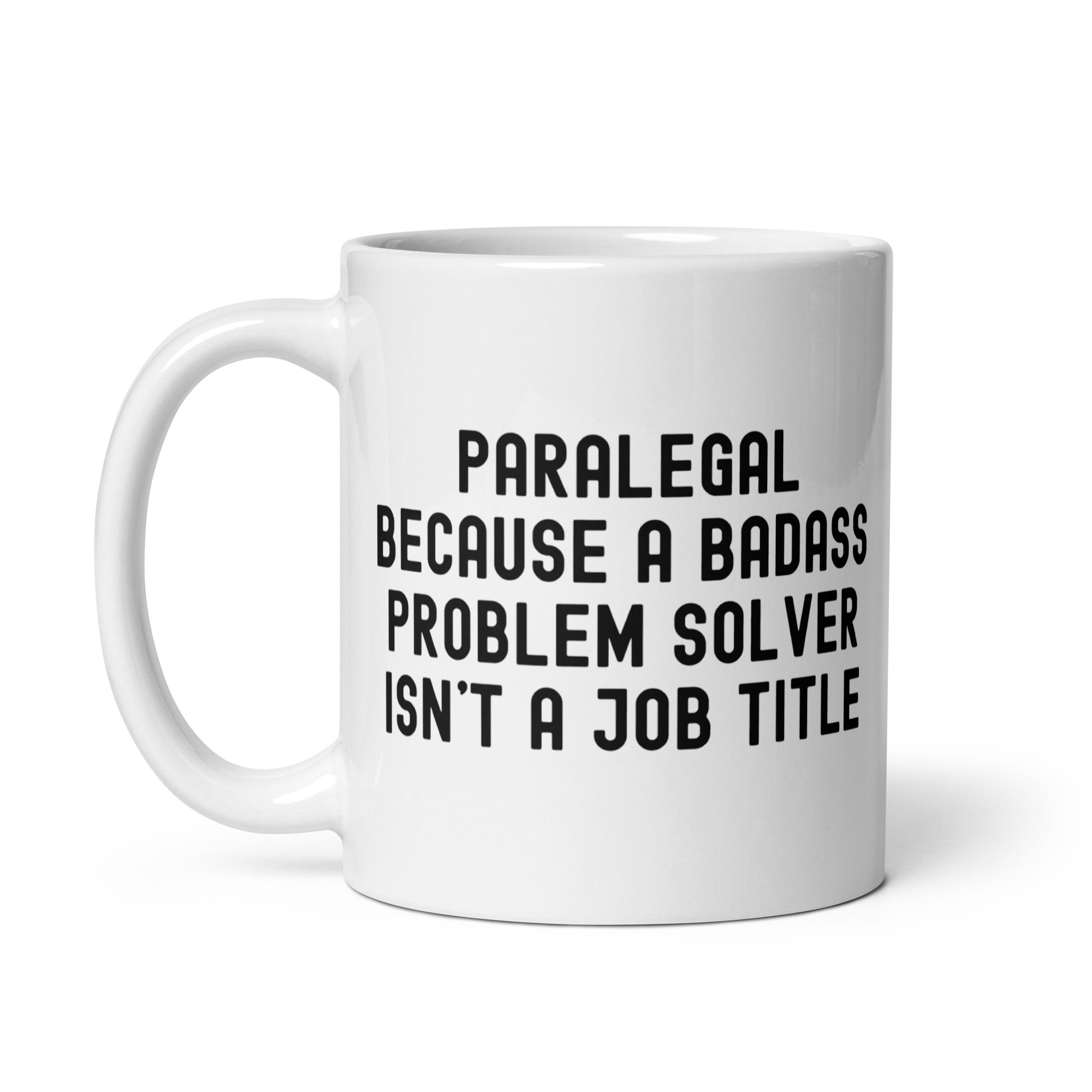 White glossy mug | Paralegal because a badass problem solver isn’t a job title