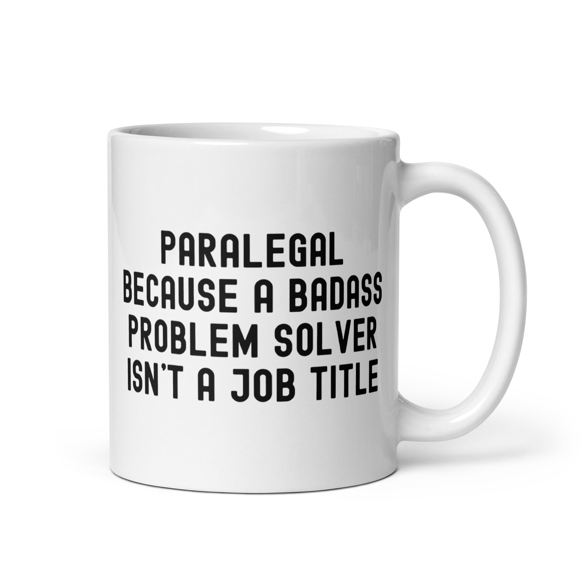 White glossy mug | Paralegal because a badass problem solver isn’t a job title